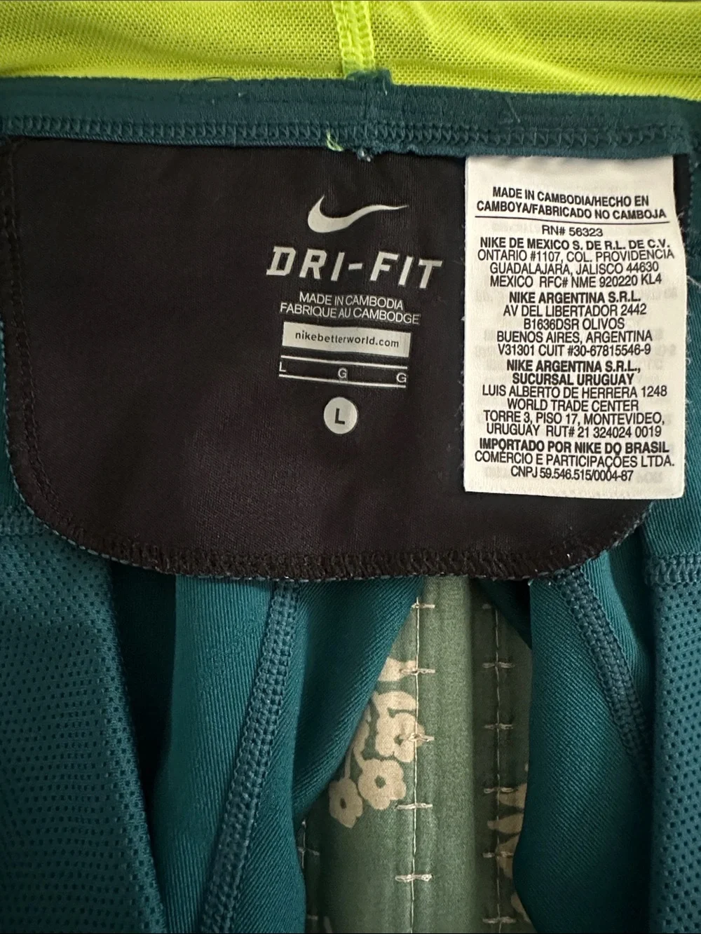Nike Teal Capri Pants with Lime Accents